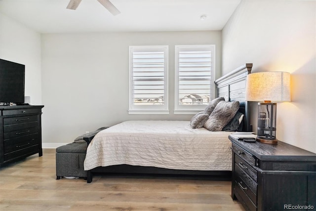 bedroom featuring light hardwood / wood-style flooring and ceiling fan