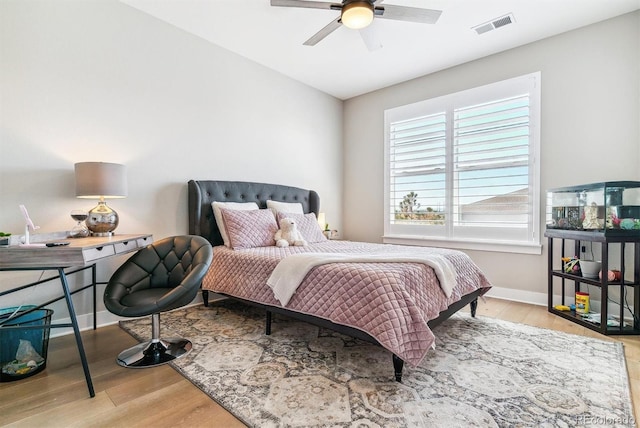 bedroom featuring ceiling fan and light hardwood / wood-style floors