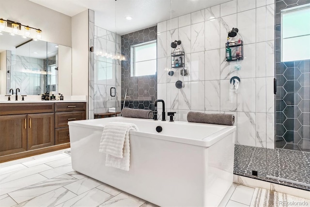 bathroom featuring vanity, plus walk in shower, and tile walls