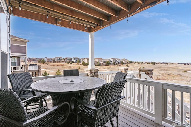 deck featuring outdoor dining area