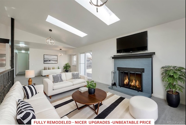 living room featuring light colored carpet, lofted ceiling with skylight, and a fireplace