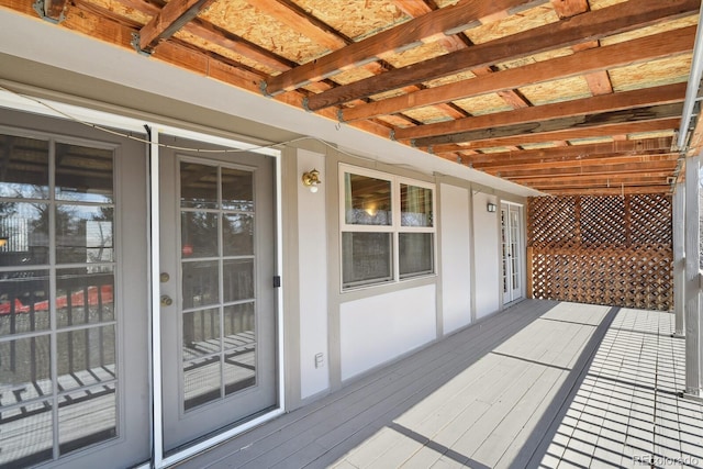 wooden terrace featuring french doors