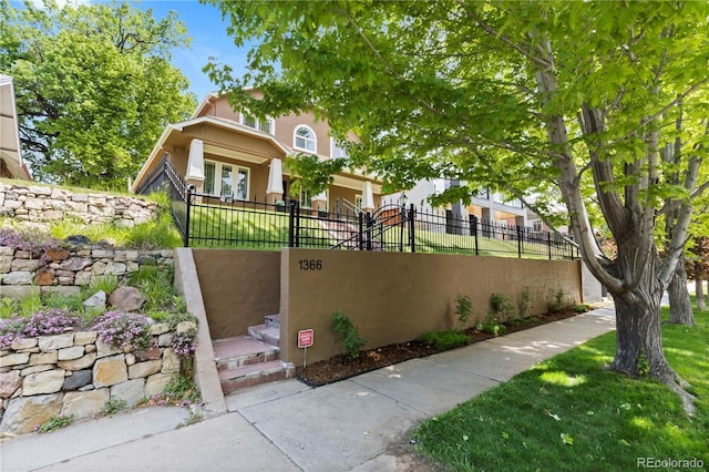 1366 S Vine St, Denver, CO 80210 - view of front of home with stucco siding