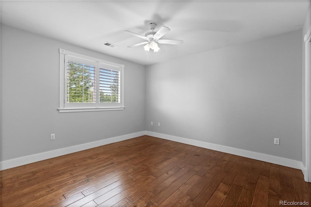 1366 S Vine St, Denver, CO 80210 - empty room with a ceiling fan, dark wood-type flooring, and baseboards