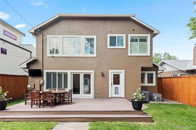 1366 S Vine St, Denver, CO 80210 - rear view of house featuring a deck, stucco siding, and central AC
