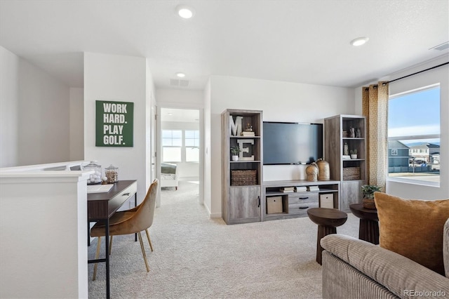 living room with light colored carpet