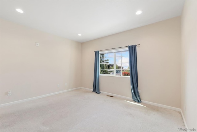 875 E 78th Ave Unit 52, Denver, CO 80229 - unfurnished room with carpet, recessed lighting, and baseboards