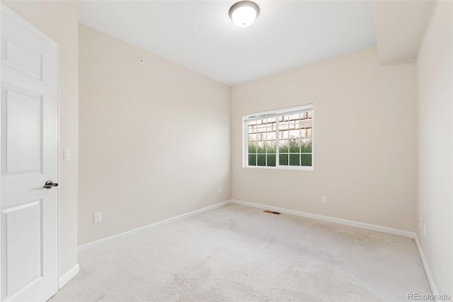 875 E 78th Ave Unit 52, Denver, CO 80229 - carpeted empty room with baseboards