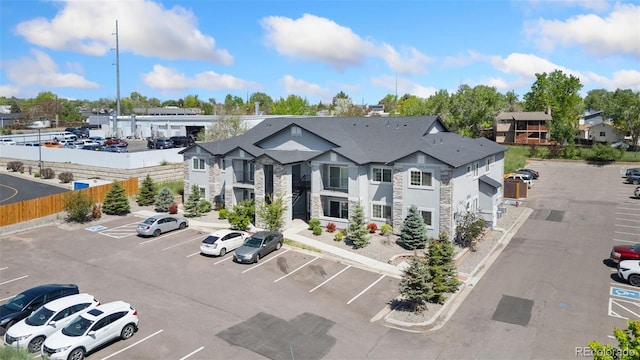 875 E 78th Ave Unit 52, Denver, CO 80229 - view of property with uncovered parking