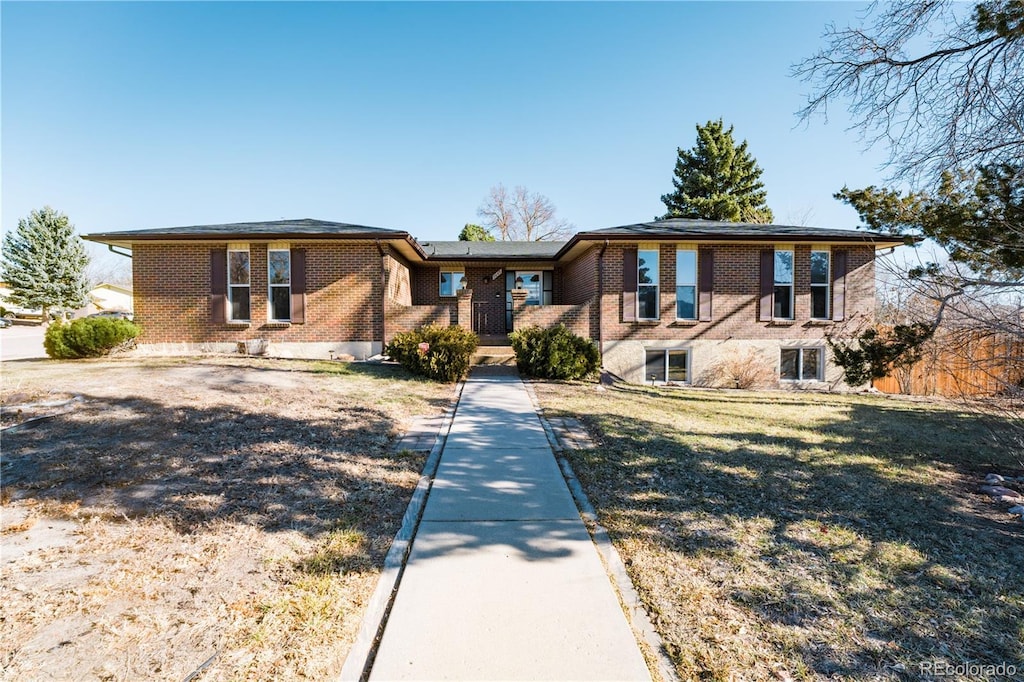 view of front of home with a front yard