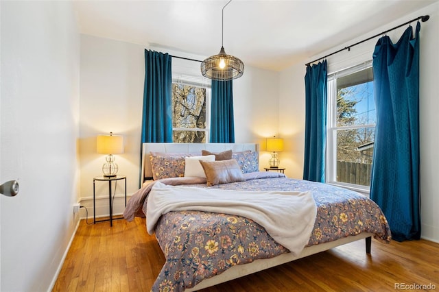 bedroom featuring hardwood / wood-style flooring