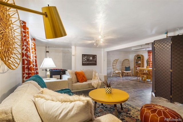 living room featuring concrete floors