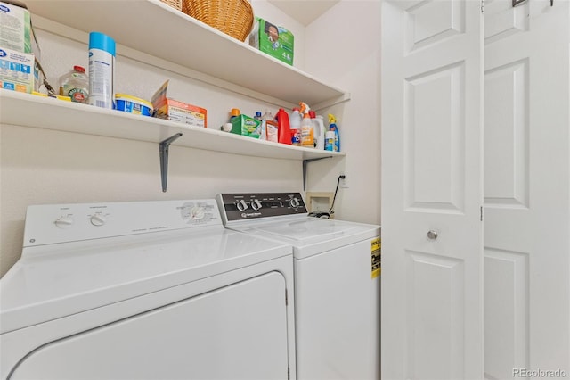 washroom featuring washer and dryer