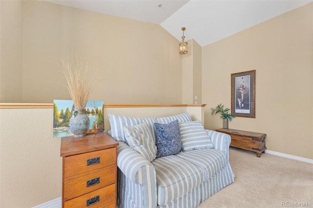 sitting room featuring lofted ceiling and light colored carpet