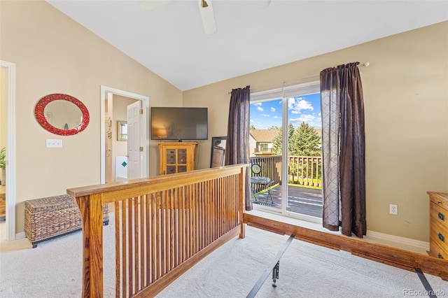 interior space with lofted ceiling and carpet flooring