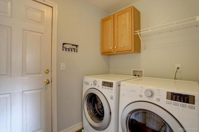 2253 E 100th Pl, Thornton, CO 80229 - laundry area featuring washing machine and dryer, cabinet space, and baseboards