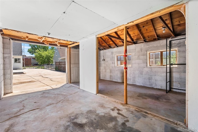 235 S 8th Ave, Brighton, CO 80601 - garage featuring concrete block wall