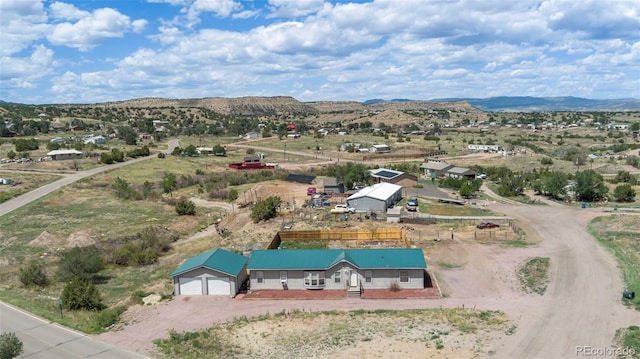 aerial view featuring a mountain view