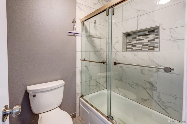 2829 S Xanadu Way, Aurora, CO 80014 - bathroom with enclosed tub / shower combo and toilet