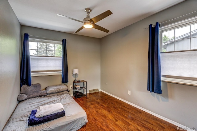 2829 S Xanadu Way, Aurora, CO 80014 - bedroom with wood finished floors and ceiling fan