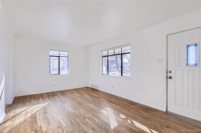 entryway with light hardwood / wood-style flooring