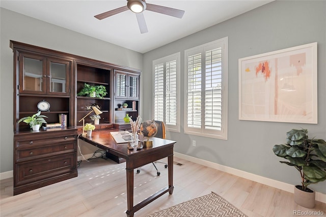 239 W Jamison Ct, Littleton, CO 80120 - office with ceiling fan, healthy amount of natural light, baseboards, and light wood-type flooring