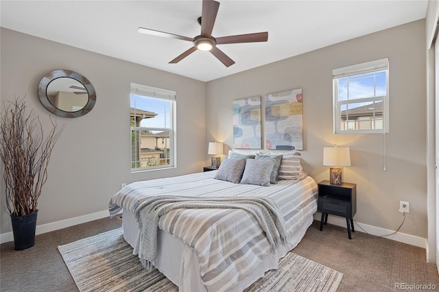 239 W Jamison Ct, Littleton, CO 80120 - bedroom with multiple windows, baseboards, and carpet