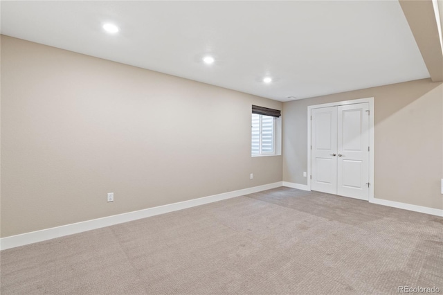 239 W Jamison Ct, Littleton, CO 80120 - unfurnished bedroom with baseboards, recessed lighting, carpet flooring, and a closet