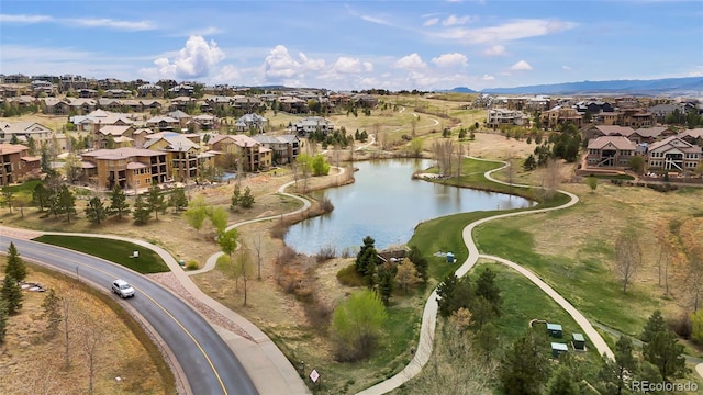 aerial view featuring a residential view and a water view