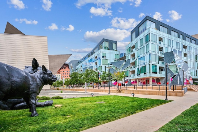 view of home's community with a lawn