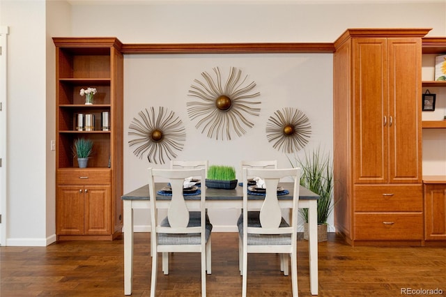 dining room with dark wood-type flooring