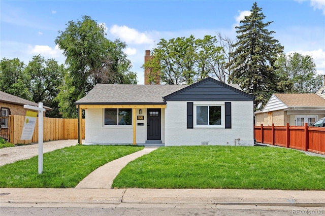 851 S Eliot St, Denver, CO 80219 - view of front of house with brick siding and a chimney