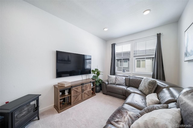 living area with recessed lighting, carpet flooring, and baseboards