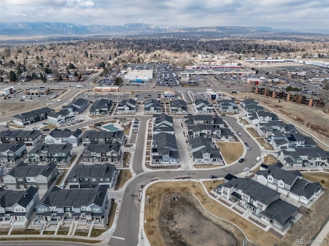 aerial view featuring a residential view and a mountain view