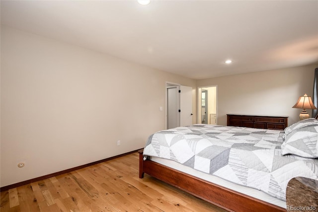 8666 E Easter Ave, Centennial, CO 80112 - bedroom with baseboards, light wood finished floors, and recessed lighting