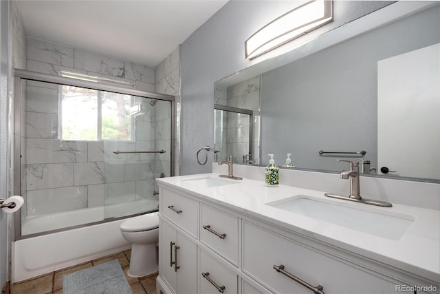 8666 E Easter Ave, Centennial, CO 80112 - full bath with toilet, enclosed tub / shower combo, double vanity, and a textured wall