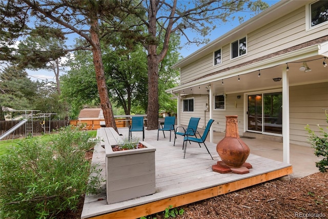 8666 E Easter Ave, Centennial, CO 80112 - wooden deck with a fenced backyard