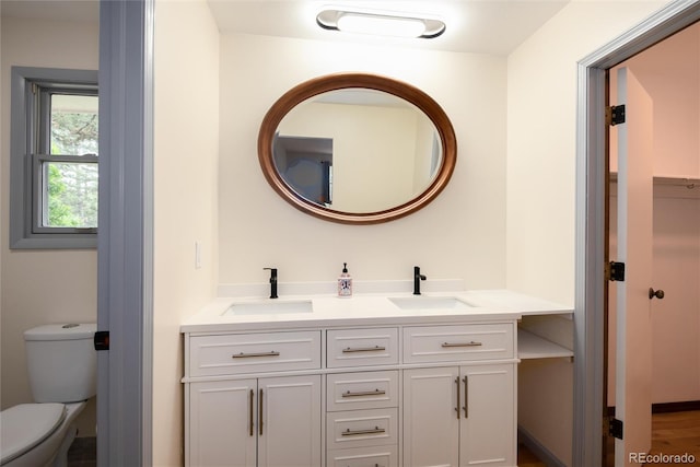 8666 E Easter Ave, Centennial, CO 80112 - bathroom with double vanity and toilet