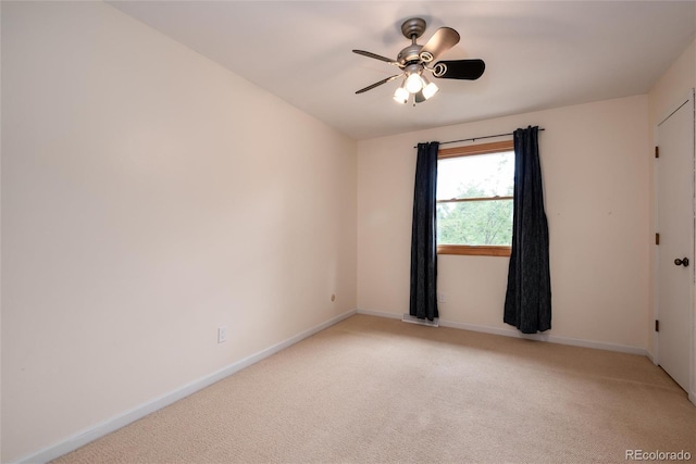 8666 E Easter Ave, Centennial, CO 80112 - empty room with light carpet, ceiling fan, and baseboards