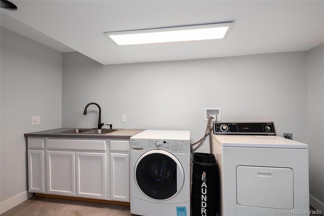 8666 E Easter Ave, Centennial, CO 80112 - laundry area with washer and dryer, cabinet space, and baseboards