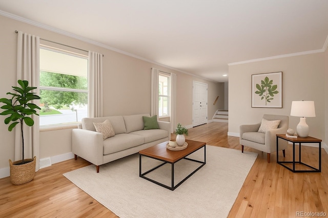 8666 E Easter Ave, Centennial, CO 80112 - living room with crown molding, baseboards, light wood-style floors, and stairway