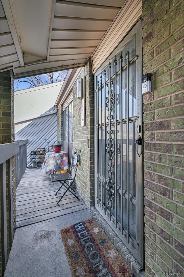 exterior space featuring brick siding