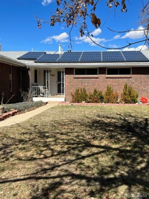 view of front of home with solar panels