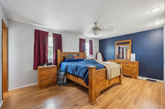3625 E 128th Pl, Thornton, CO 80241 - bedroom with light wood-type flooring, baseboards, and a ceiling fan