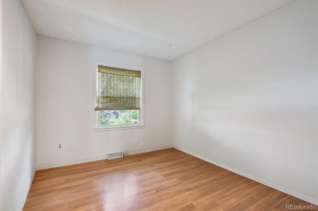 3625 E 128th Pl, Thornton, CO 80241 - empty room featuring light wood finished floors and baseboards