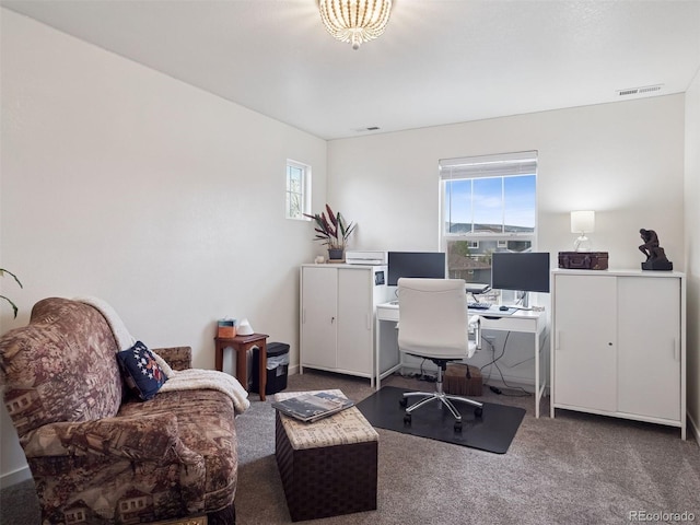 carpeted office featuring visible vents
