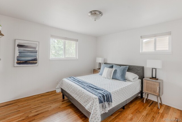 755 34th St, Boulder, CO 80303 - bedroom featuring wood finished floors and baseboards