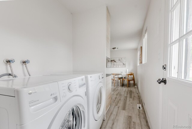 755 34th St, Boulder, CO 80303 - laundry area featuring light wood finished floors and washing machine and dryer