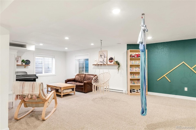 living area with carpet floors, recessed lighting, and a baseboard radiator