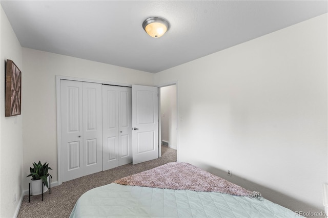 134 Hayes Dr, Colorado Springs, CO 80911 - carpeted bedroom with a closet and baseboards